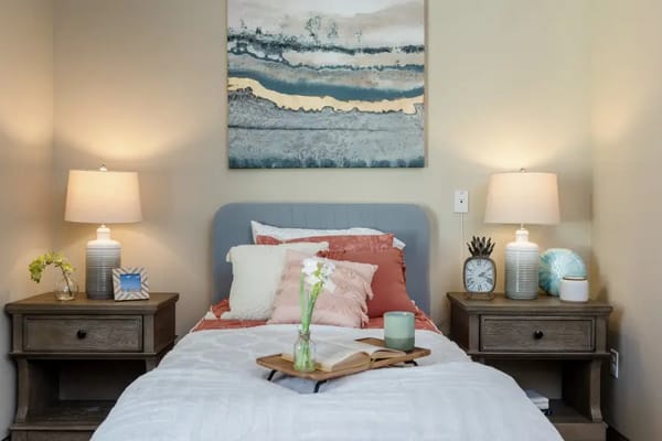 Cozy private room with bed and artwork