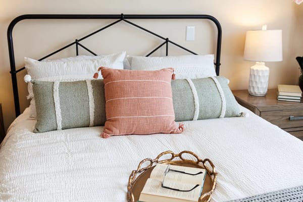 Stylish bedroom setup with decorative pillows