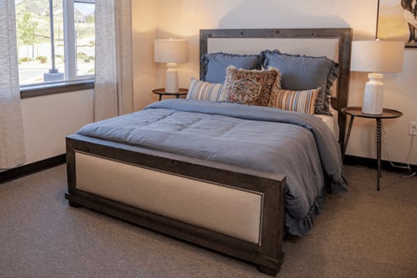 Well-furnished bedroom in a senior living facility