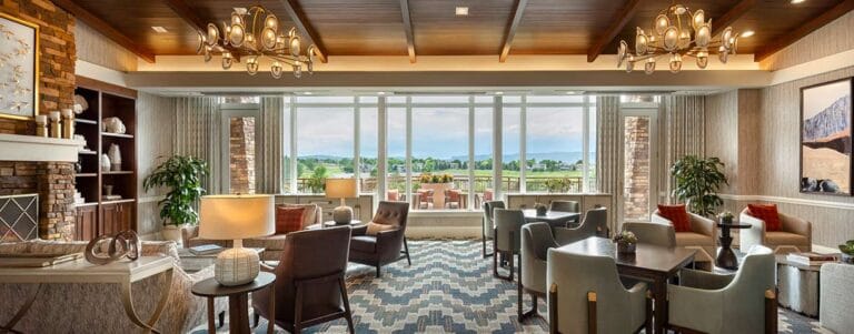 Bright and inviting common area with seating and large windows