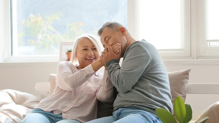 Two residents enjoying each other's company indoors