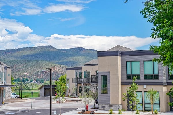Building exterior with mountains in the background