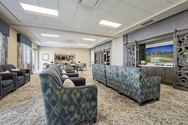 Common area with seating and entertainment center