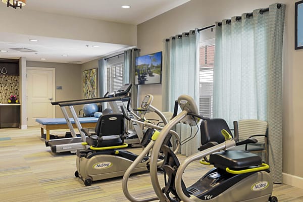 Interior view of a fitness area with exercise equipment