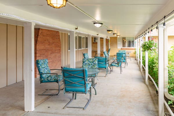 Covered patio area with seating