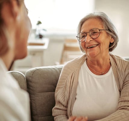 Happy resident interacting with a caregiver