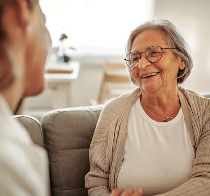 Happy resident interacting with a caregiver