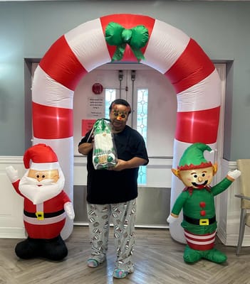 Resident celebrating with holiday decorations