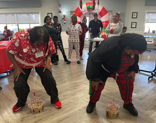 Staff participating in a holiday-themed activity