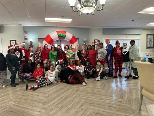 Staff and residents celebrating with festive attire