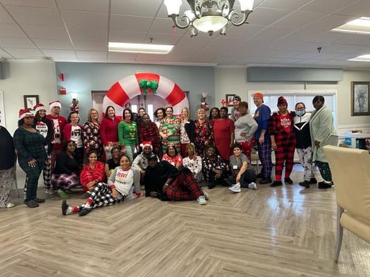 Staff and residents celebrating with festive attire