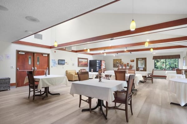 Interior dining area with tables and chairs