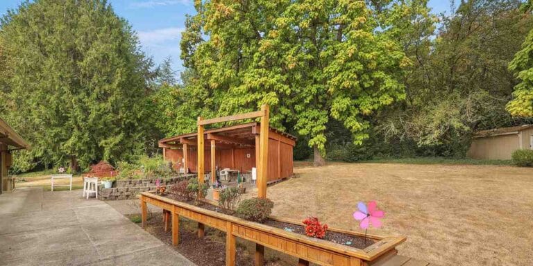 Outdoor space with garden features and seating