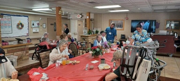 Residents enjoying a meal in the dining area