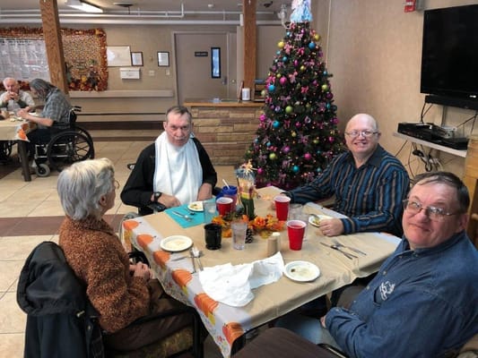Residents enjoying a meal in the dining room