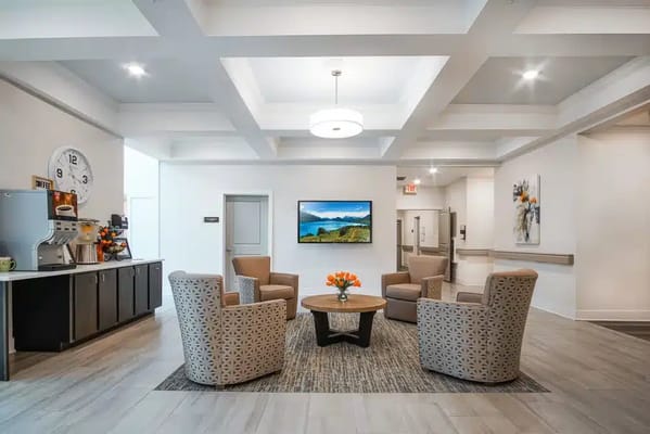 Bright common area with comfortable seating and decor