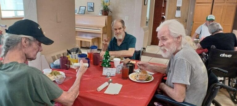 Residents enjoying a meal in the dining area