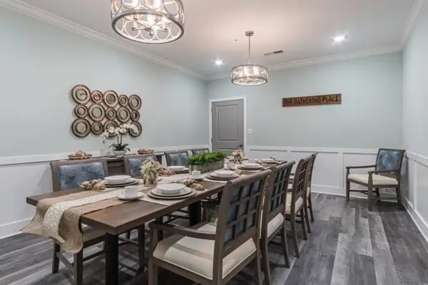 Elegant dining area with a large wooden table and decor