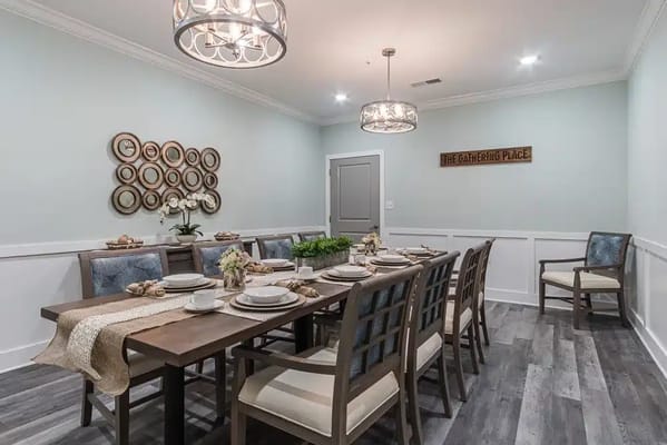 Elegant dining area with a large wooden table and decor