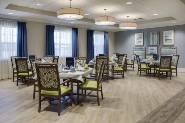 Dining room with tables set for meals