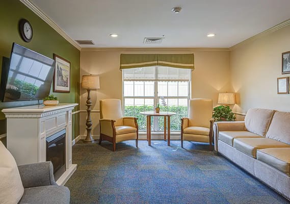 Bright common area with seating and natural light