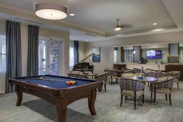 Interior view of a game room with a pool table