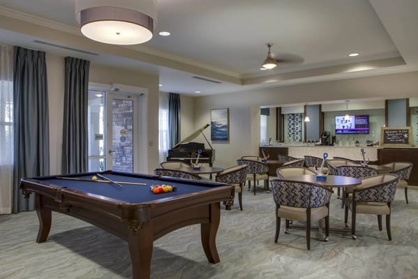 Interior view of a game room with a pool table