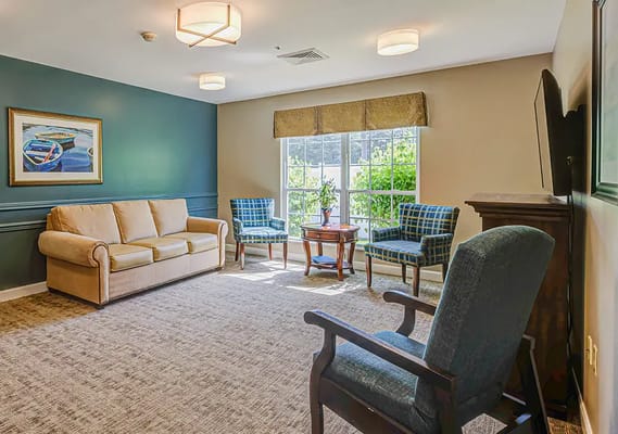 Cozy common area with seating and natural light