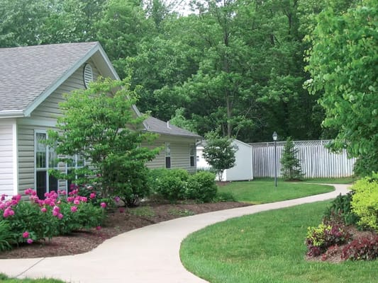 Garden path leading to a senior living facility