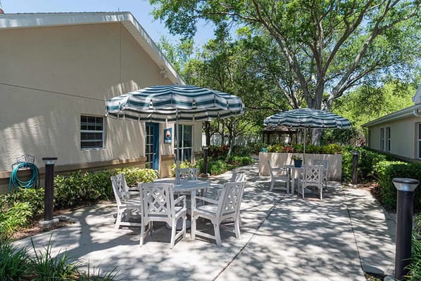 Outdoor seating area with umbrellas and tables