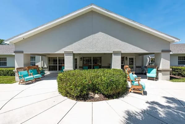 Exterior view of the facility with outdoor seating