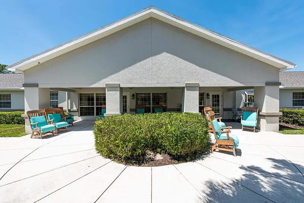 Exterior view of the facility with outdoor seating