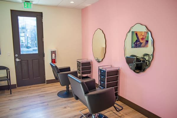 Interior of a salon with mirrors and salon chairs