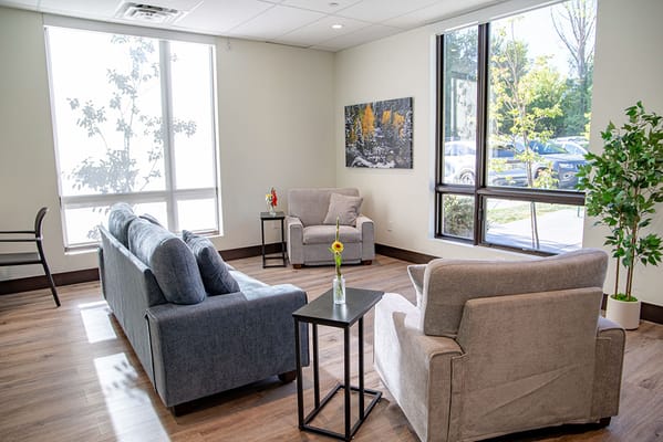 Bright interior common area with comfortable seating