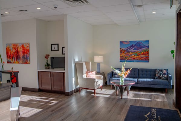 Cozy common area with seating and artwork