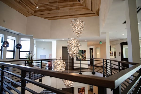 Interior view of a modern common area with decorative lighting