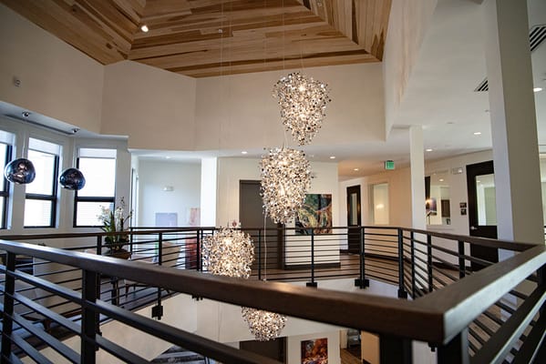 Interior view of a modern common area with decorative lighting