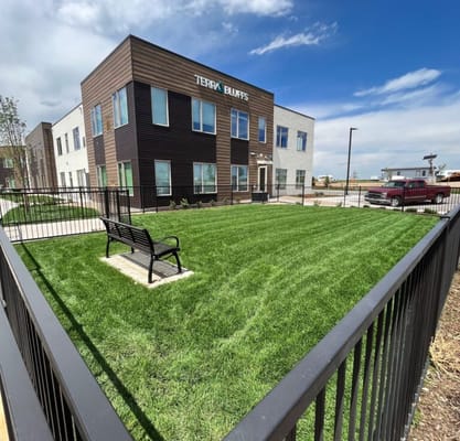Exterior view of Terra Bluffs facility with landscaped area