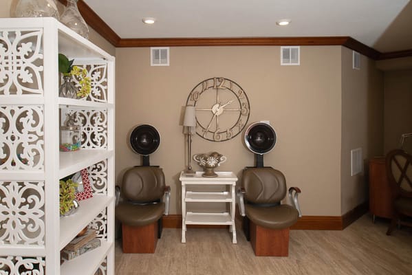Interior view of a beauty/hair salon area with chairs