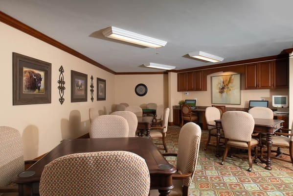 Bright common area with tables and chairs