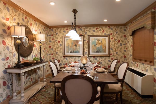 Bright dining room with elegant decor and table setting