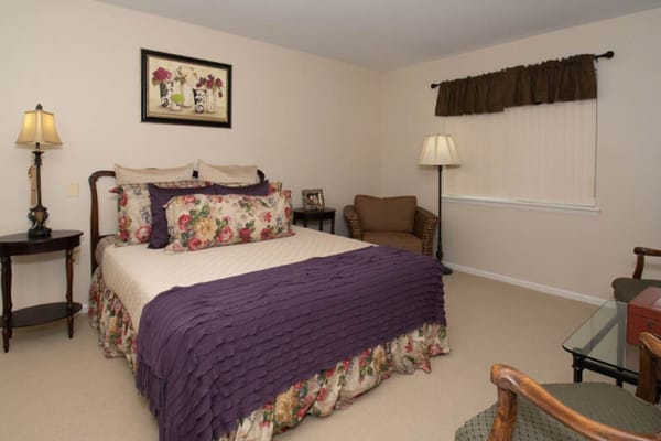 Cozy private resident room with floral decor