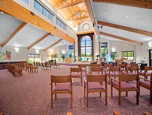 Interior view of a gathering space with wooden beams