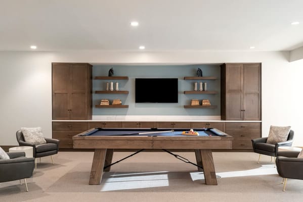 Interior common area with a pool table and seating
