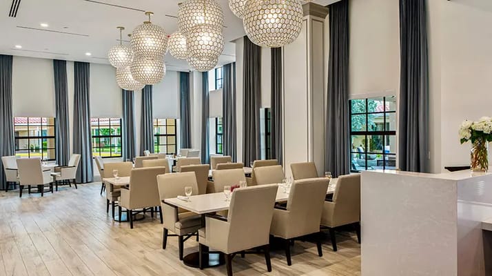 Bright dining area with modern decor and seating