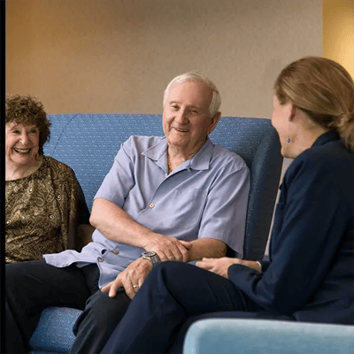 Residents engaging in conversation in a common area