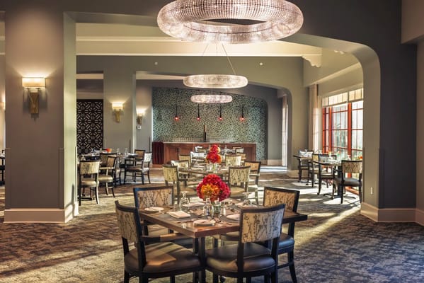 Elegant dining area with decorative lighting and flowers
