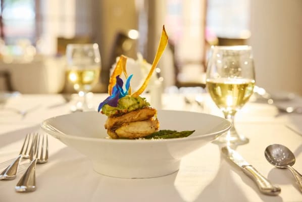 A gourmet meal served in a dining room setting