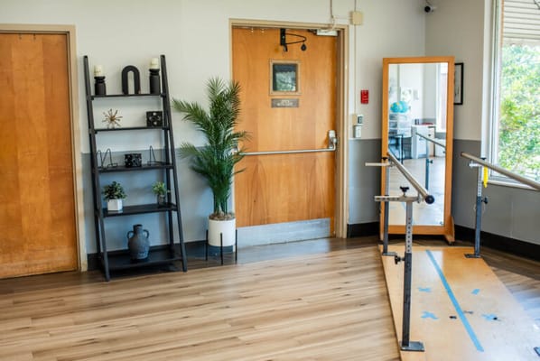 Interior view of a therapy room with equipment