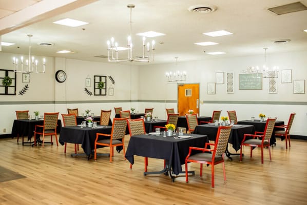 Dining room with tables set for meals
